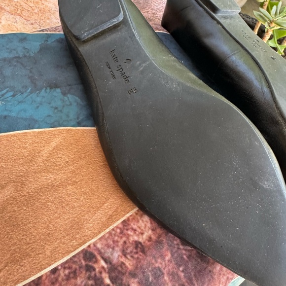 kate spade Black Leather Bow-Trim Flats with Gold Accent - Picture 7 of 10